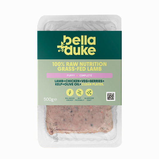 Packaged dog food with bella duke branding on a white background